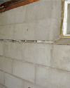 Severely buckling foundation walls in a home in Pittston in need of repairs.