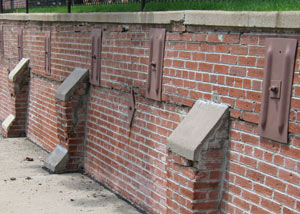 Rusted wall plate anchors in a retaining wall repair in Shippensburg.