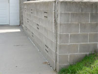 A retaining wall separating from the adjoining walls in Dover