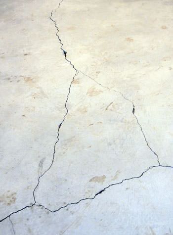 severely cracked, heaving slab floors in a home in Pottsville