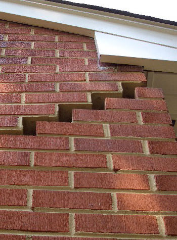 photo of a rotating foundation wall with cracks in Whitehall