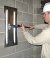 Tightening a wall anchor plate in Bethlehem, Pennsylvania