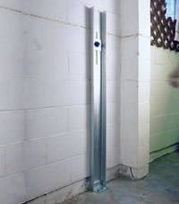 A failing foundation wall repaired with a foundation wall channel anchor system in a Bethlehem home.