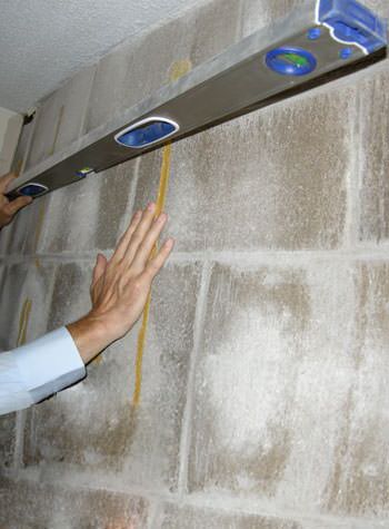 severe foundation wall failure symptoms of a basement wall in Dover
