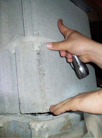 a completely failing concrete crawl space support pillar in Waynesboro