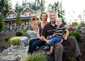 A happy family outside a home with a repaired foundation in Pottsville