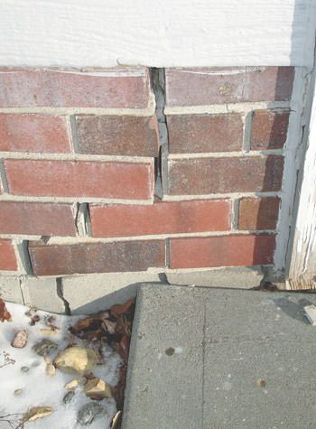 Severe street creep damage to a garage wall outside a Shippensburg home