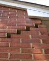 Serious damage to a foundation wall due to settlement of a home in Hazleton