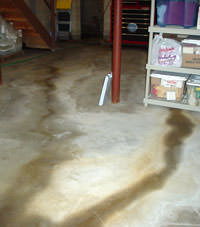 Flooding entering a basement through a floor crack in Hazleton