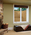 An egress window well installed within a finished basement space in Easton.